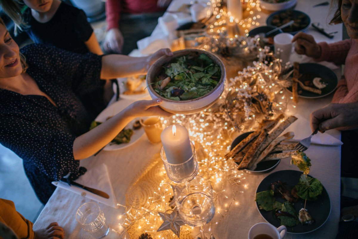 Holiday meal passing food.